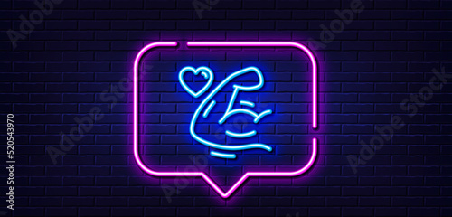 Neon light speech bubble. Strong arm line icon. Strength muscle sign. Gym fit training symbol. Neon light background. Strong arm glow line. Brick wall banner. Vector