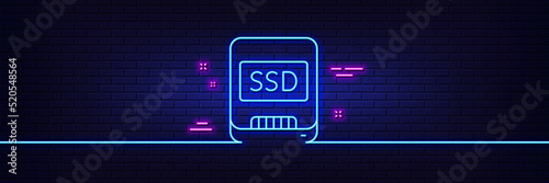 Neon light glow effect. Ssd line icon. Computer memory component sign. Data storage symbol. 3d line neon glow icon. Brick wall banner. Ssd outline. Vector
