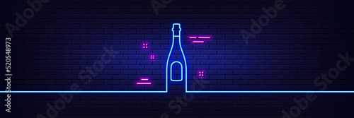 Neon light glow effect. Champagne bottle line icon. Anniversary alcohol sign. Celebration event drink. 3d line neon glow icon. Brick wall banner. Champagne outline. Vector