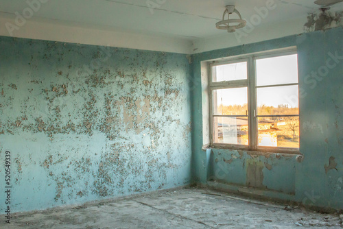 Empty classroom with one window, inside an abandoned Soviet school in Martvili, Georgia. 