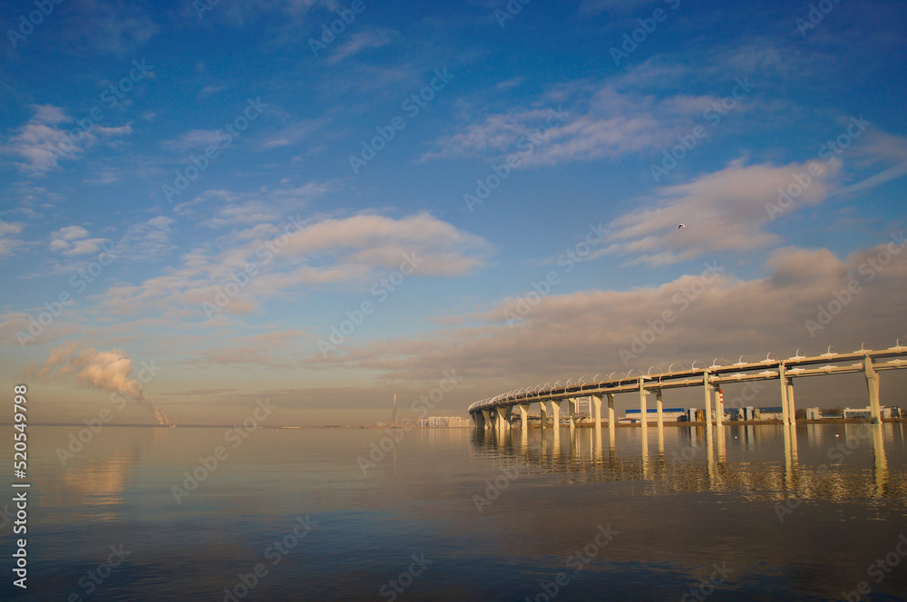 The overpass of the Western Expressway Diameter in St. Petersburg runs over the Neva bay, a view from the island of Canonersky