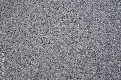 Granite stone, close-up of white, gray granite stone facade with interesting structure. Copy space for your design. Web banner. 