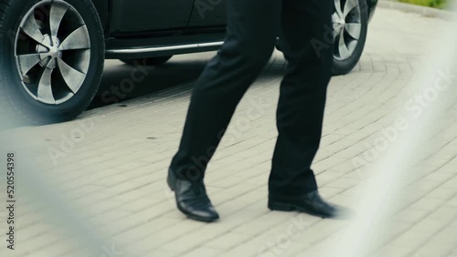 Secret service agents get out of the car.