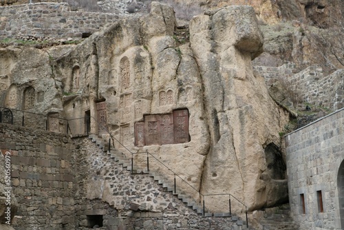 Entrance of Geghard monastery with Armenian Khachkars photo