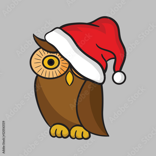 Cute brown owl wearing a Santa hat covering one eye