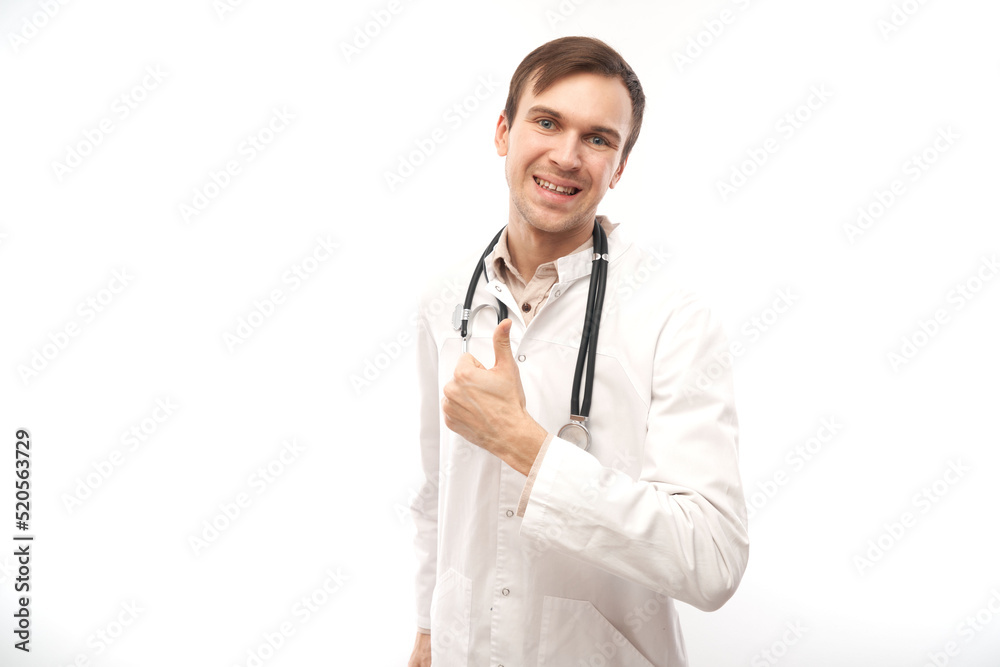 Portrait of happy doctor in white medical coat showing gesture all is well isolated on white background with copy space Portrait of happy doctor in white medical coat showing gesture all is well isolated on white background with copy space