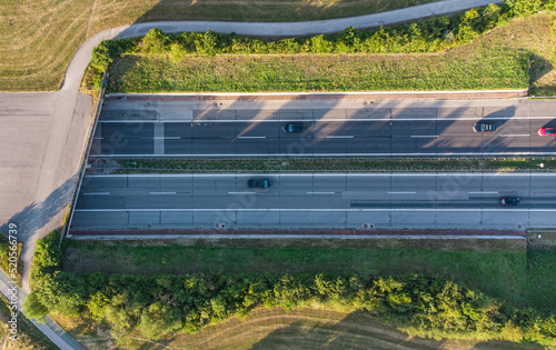 German highway coming out of tunnel seen from above near Munich with car traffic