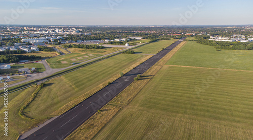 Aerial view from plane landing. Runway of former airport in Neubiberg, south Germany seen from above