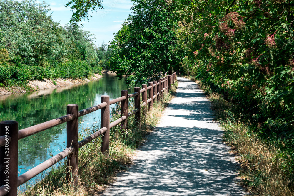 Villoresi Canal, Metropolitan City of Milan, Italy - 07 09 2022: This photo was taken near the Villoresi Canal, a typically Italian marvelous place. Villoresi Canal, Metropolitan City of Milan, Italy - 07 09 2022: This photo was taken near the Villoresi Canal, a typically Italian marvelous place.