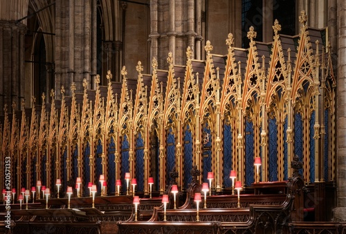 Choir seats illuminated at night at Westminster Abbey, London photo