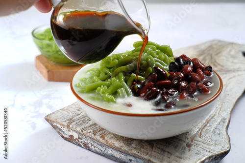 Malaysian Desserts Called Cendol. Cendol is Made From Crushed Ice Cubes,pandan short vermicelli and Red Bean.