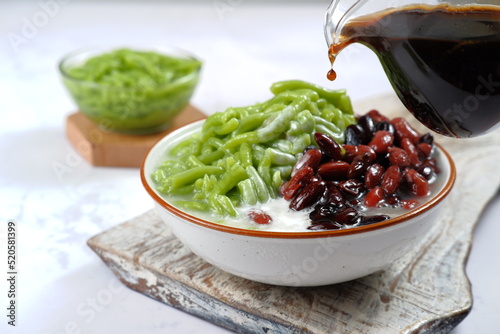 Malaysian Desserts Called Cendol. Cendol is Made From Crushed Ice Cubes,pandan short vermicelli and Red Bean. photo