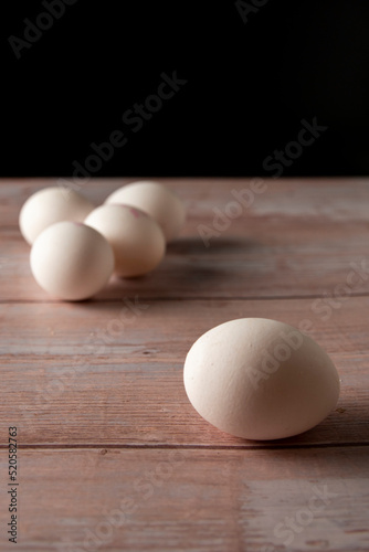 Fresh free range eggs on wooden table