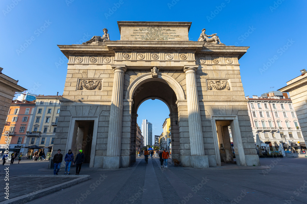 Fototapeta premium MILAN, ITALY, MARCH 5, 2022 - View of Garibaldi Gate (Porta Garibaldi) in the center of Milan, Italy.