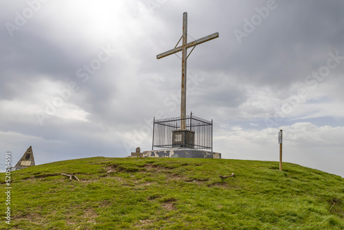 The big cross on the summit of Antola Mount at 1597 metres located between the Scrivia valley, the Trebbia valley and the Borbera valley in Genoa province, Italy. photo