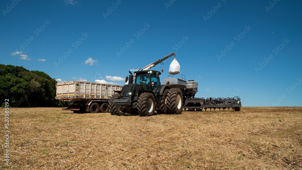 Fototapeta premium combine harvester working in a field