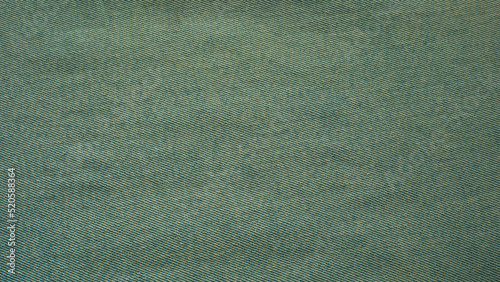 Photo Close-up detail of light blue denim fabric texture