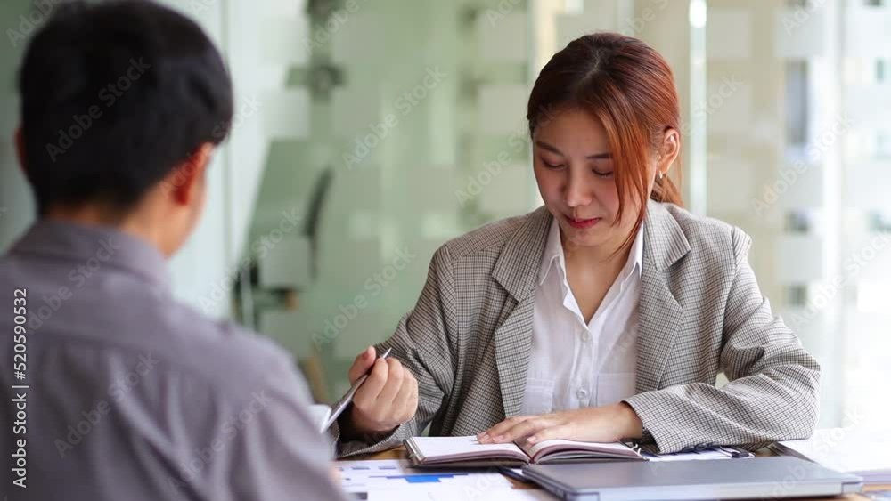 Job interview. Businesswoman discussing projects with colleagues in the office. Job interview. Businesswoman discussing projects with colleagues in the office.