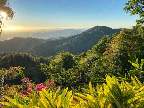 View from veranda during sunset on mountain range, and Tropical National Forest of El Yunque photo