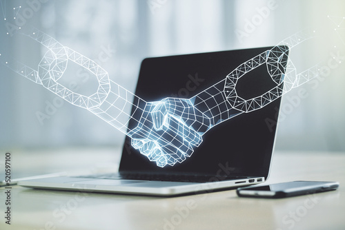 Creative abstract block chain technology sketch with handshake on modern laptop background, future technology and blockchain concept. Double exposure