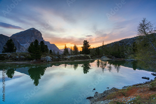 Pristine Lake Limides at dawn with Tofana di Rozes in background, Dolomites, Cortina d'Ampezzo, Belluno province, Veneto, Italy