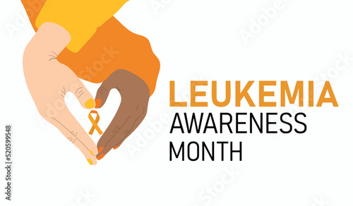 Leukemia awareness month. Hands making heart shape holding awareness ribbon