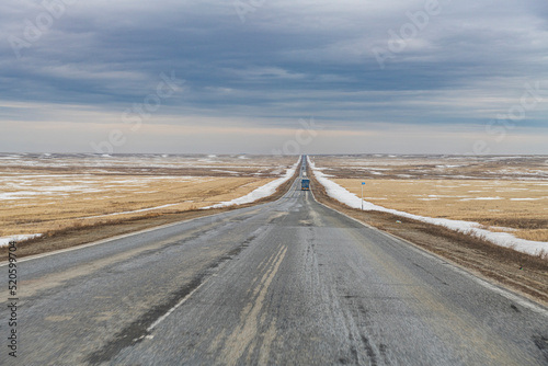 Long straight road, south of Kostanay, northern Kazakhstan photo