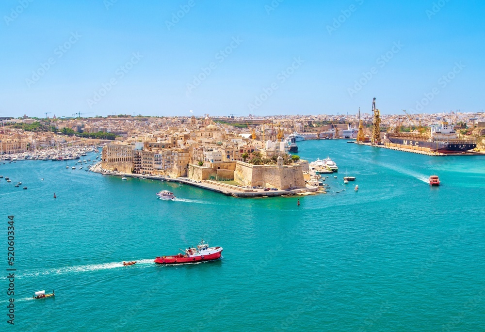 Shipping in Valetta's ancient Grand Harbour, Valletta, the Republic of Malta Shipping in Valetta's ancient Grand Harbour, Valletta, the Republic of Malta