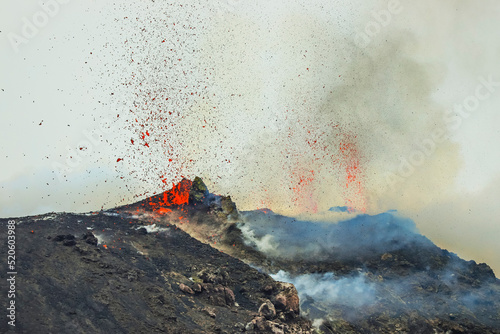 Lava bombs erupt from multiple vents on volcano, active for at least 2000 years, Stromboli, Aeolian Islands, UNESCO World Heritage Site, Sicily, Italy photo