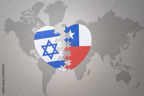 puzzle heart with the national flag of chile and israel on a world map background.Concept.