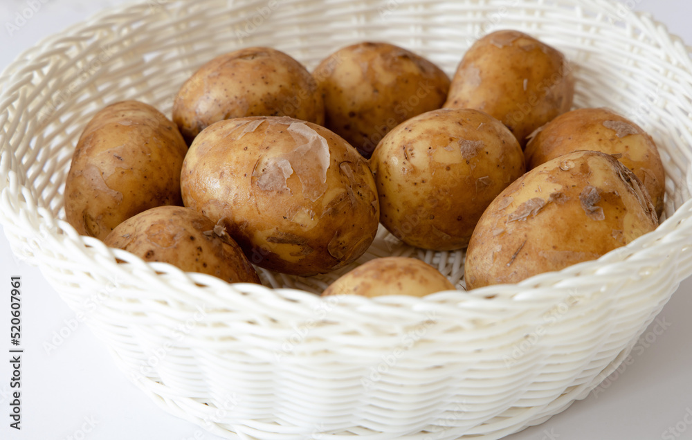 Heap of young potatos isolated on white background Heap of young potatos isolated on white background