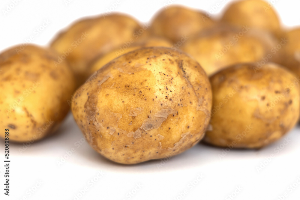 Heap of young potatos isolated on white background Heap of young potatos isolated on white background