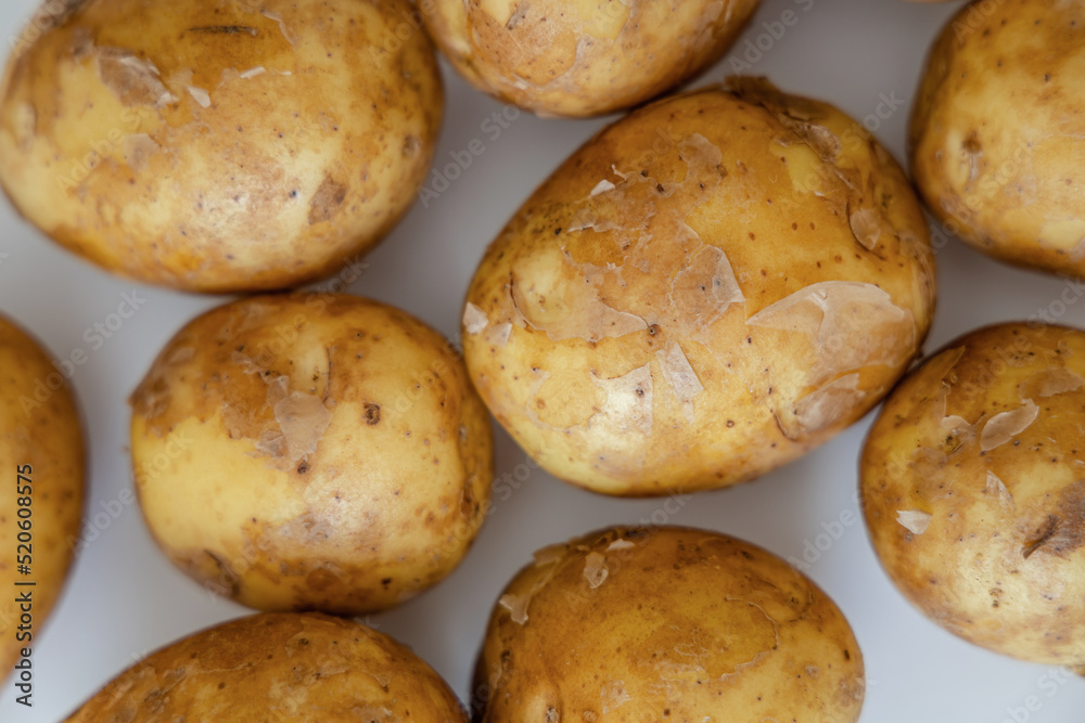 Heap of young potatos isolated on white background Heap of young potatos isolated on white background