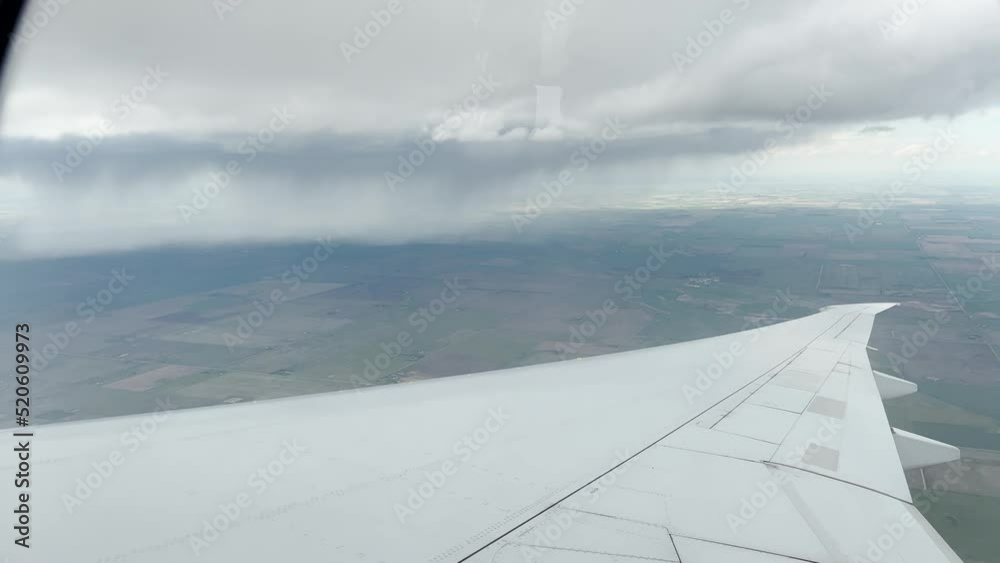 Scene of plane with Rocky mountains in the background arriving at Calgary airport, Canada Scene of plane with Rocky mountains in the background arriving at Calgary airport, Canada