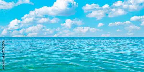 Sea water panorama blue sky with white clouds