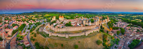 Medieval castle town of Carcassone at sunset, France photo