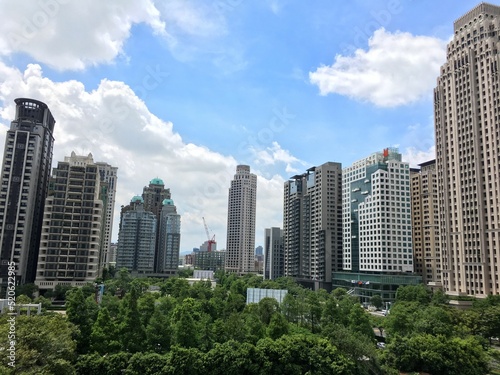 Beautiful view of modern buildings under a cloudless blue sky in Taichung, Taiwan photo