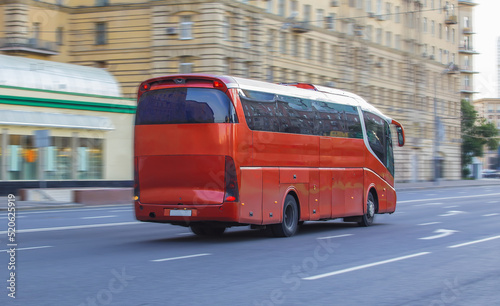 tourist bus goes on street