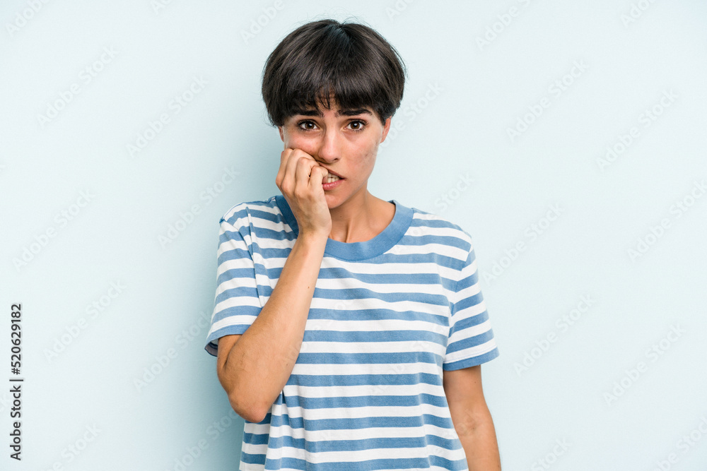 Young caucasian woman with a short hair cut isolated biting fingernails, nervous and very anxious. Young caucasian woman with a short hair cut isolated biting fingernails, nervous and very anxious.