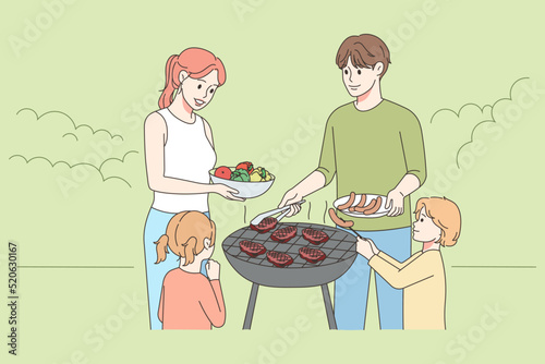 Happy family with kids enjoy picnic 