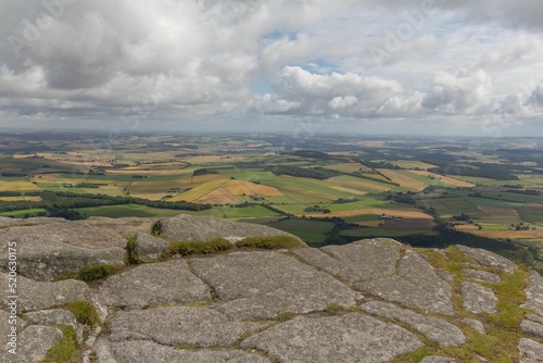 Mesmerizing field landscape from the top of Mither Tap of Bennachie in Aberdeenshire, Scotland, UK photo