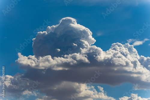 Big, fluffy clouds billowing 