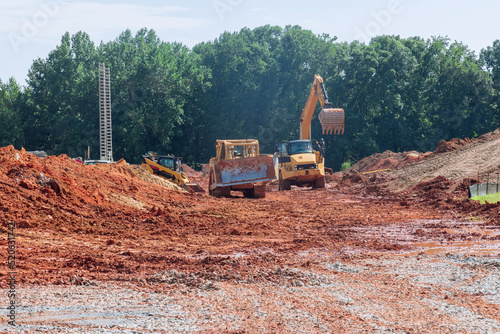 In performing works of improving the territory, an excavator is used for earthworks