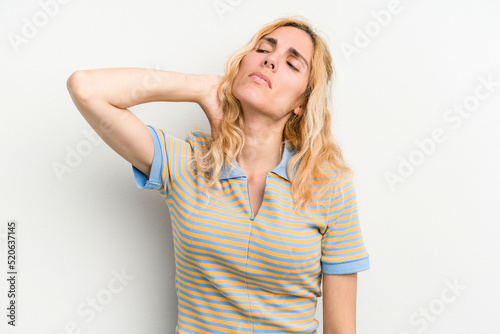 Young caucasian woman isolated on white background massaging elbow, suffering after a bad movement.