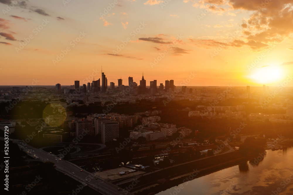 Poland, Warsaw at sunset. Aerial drone skyline.
