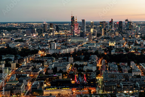 Poland, Warsaw capital city during twilight. Aerial drone view. © 9parusnikov