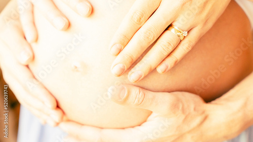 Pregnant hands woman belly. Happy pregnancy woman and husband hugging pregnant belly. Concept maternity  pregnancy  childbirth.