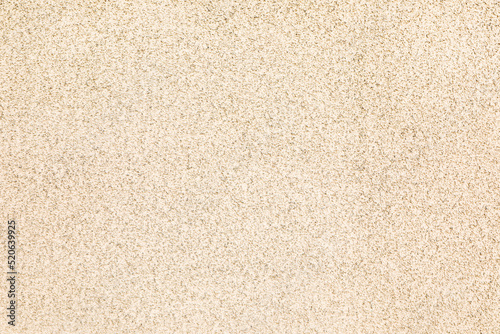 Texture of beige plaster wall as background