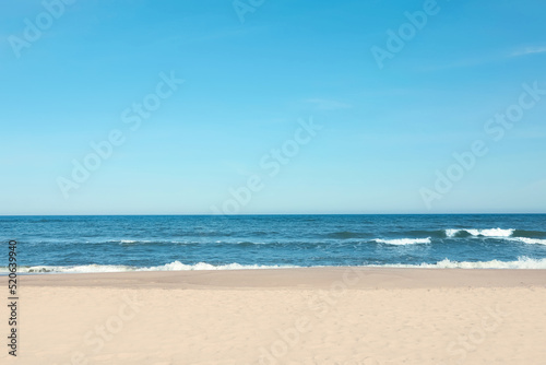 Picturesque view of beautiful sea and sandy beach on sunny day