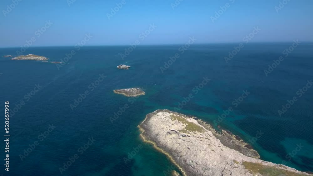 The small islands at Cape Victory (North East cape) of Island Cyprus aerial view in May 2019 day time sunny at the coast of Mediterranean Sea North Cyprus The small islands at Cape Victory (North East cape) of Island Cyprus aerial view in May 2019 day time sunny at the coast of Mediterranean Sea North Cyprus